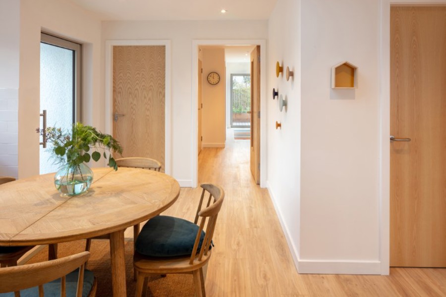 Image of the welcome kitchen with view through hallway